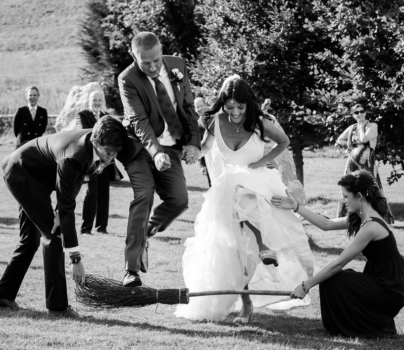 20120831160808-2 reportage wedding photographer in kent - jumping over broom